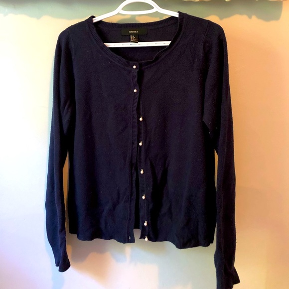Warm, button up sweater with faux pearl buttons. - Picture 1 of 2
